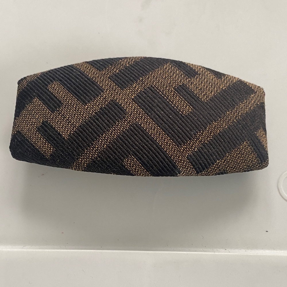 Fendi Black and Brown Zucca barrette. gold clasp hardware.